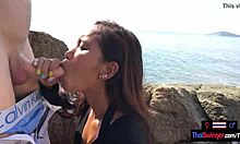 Asian teen girlfriend sucks european boyfriend's monster cock publicly outdoors