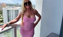 Curvy blonde milf flashes big natural tits and wet shaved pussy under tiny pink dress outdoors