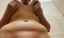 Squirting teen rides monster cock in public bathroom closeup