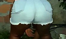 Neighbor's huge fat ass shakes while cleaning yard