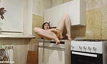 brunette solo stuffs bananas double in shaved kitchen pussy 🍌🍌
