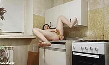 brunette solo stuffs bananas double in shaved kitchen pussy 🍌🍌