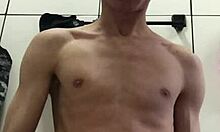 damn this hung young stud jerks his massive cock and explodes everywhere