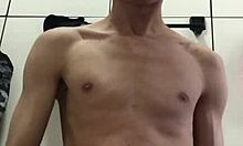 damn this hung young stud jerks his massive cock and explodes everywhere