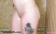 tall cute brunette enjoys her steamy shower time