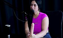 angel baronesa in sheer red shows off blowjob skills gets tits sucked plug slips into ass then pees for client's jerk off