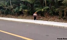 Priscila struts streets in see-through skirt no panties flashing big natural tits