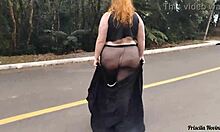 Priscila struts streets in see-through skirt no panties flashing big natural tits