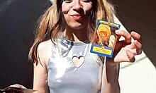 bonneyuwu teases her sexy body in cosplay outfits showing off cards outdoors