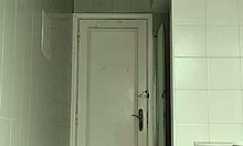 Sexy Guy Shaves Pubes Smooth in Black Beach Shorts Bathroom