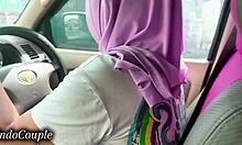 indonesian hijab wife sucks boyfriend's cock while driving in viral jakarta car video
