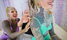 Tattooed goth sluts take double cocks in wild threesome facial gape fest