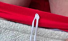 Girlfriend fingers wet shaved pussy outdoors with sneaky reach around