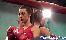 Busty lesbian babes wrestle and lick tits on floor