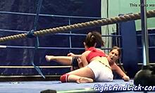 Busty lesbian babes wrestle and lick tits on floor