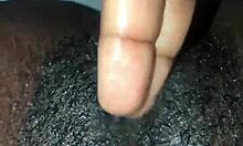 Ebony whore with small tits fingers wet pussy lips to orgasm