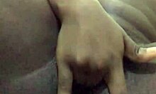 Ebony whore with small tits fingers wet pussy lips to orgasm