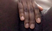 Ebony whore with small tits fingers wet pussy lips to orgasm