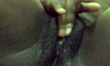 Ebony whore with small tits fingers wet pussy lips to orgasm