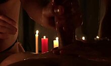 Two oiled latina babes kiss and fuck in candlelit threesome