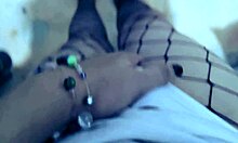 Horny latina tranny stepsis strips pantyhose and strokes tiny cock for you