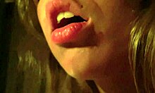 Two oiled latina babes kiss and fuck in candlelit threesome