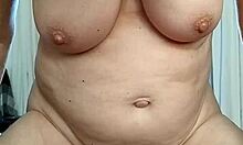 Naughty housewife teases orgasm with her favorite dildo toy