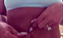 swapping bellybutton ring for edgy stiletto heel charm closeup