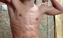 Skinny flexible boy stretches and flexes right after studying.