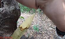 damn this perverted slut squirts piss all over that wooden stake deep in the forest