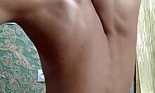 Skinny flexible boy stretches and flexes right after studying.