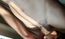 hot guy with big dick strokes cock hard masturbating public window close-up