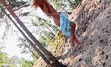 WOW! redhead teen strips NAKED deep in the FOREST!