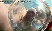 gilf with tan lines jerks huge cock then takes slowmo cumshot in water with friend watching closeup