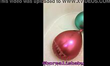 Tattooed Babe Inflates Balloons While Teasing in Sudsy Bath