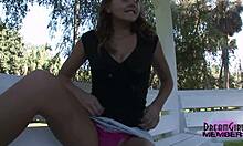 college cutie lifts skirt for shaved pussy upskirt flash in florida wilds