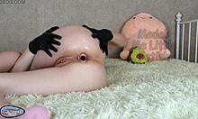 damn, stepsis pisses in latex gloves while buttplug stretches her ass and she rubs that big clit