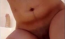 i love taking it deep in my ass while my tits bounce in the shower