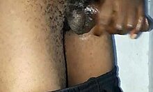 Kenyan amateur strokes massive black monster cock handjob on camera