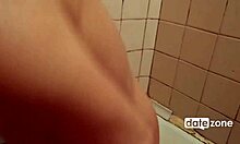 a sultry brunette soaks up in bubbly bath, rubbing her wet curves slow