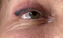 Mature lady moans as huge load blasts across her eyes and face