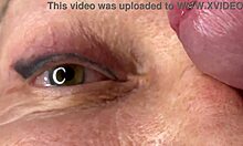 Mature lady moans as huge load blasts across her eyes and face
