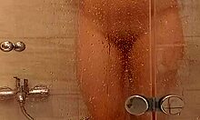 milf with big tits big ass caresses wet pussy in steamy bath