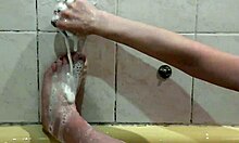 beautiful teen assol fingers wet pussy in soapy bath with foam on tits ass