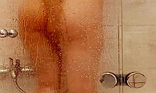 milf with big tits big ass caresses wet pussy in steamy bath