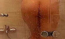 milf with big tits big ass caresses wet pussy in steamy bath