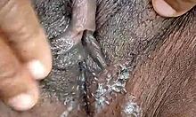 ebony teases wet pussy on webcam