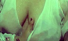 Viral Asian student soaks her huge tits and curvy body alone in steamy shower bath