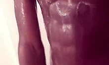 Watch this tattooed teen stroke monster cock in shower till cumshot sprays