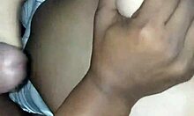 Amateur black whore gives sloppy interracial titjob and deep blowjob on huge cock close-up